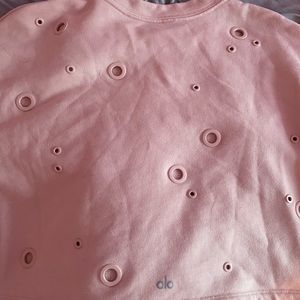 Light pink ALO Yoga bubble hole top. Size small.